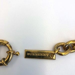 BURBERRY Black skinny leather belt with gold chain link. Size XS